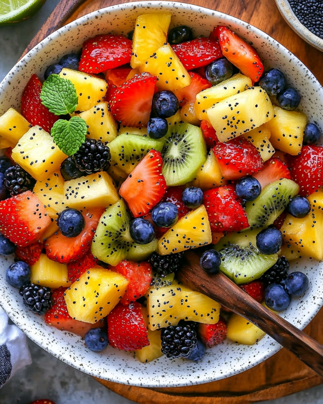 Fresh Fruit Salad with Delightful Honey Lime Poppy Seed Dressing 5 fresh-fruit-salad-with-delightful-honey-lime-poppy-seed-dressing.webp
